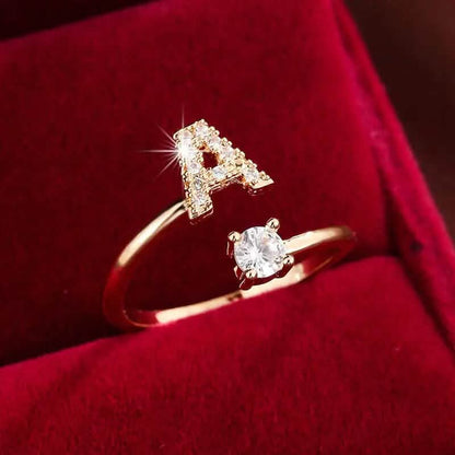 Adjustable Copper Initial Ring with Four-Claw Round Zirconia